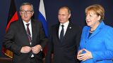Путин встретился в Париже с канцлером Германии и главой Еврокомиссии