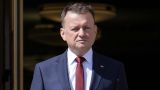 Парад снятых орденов: бывший глава Минобороны Польши отказался от награды Киева