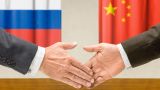 Почти половина торговли между Россией и Китаем ведется в нацвалютах — Мишустин
