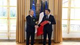 Why did the French president speak Uzbek?