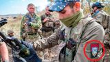 Словацкий фотограф запечатлел украинских боевиков с нацистской символикой на униформе
